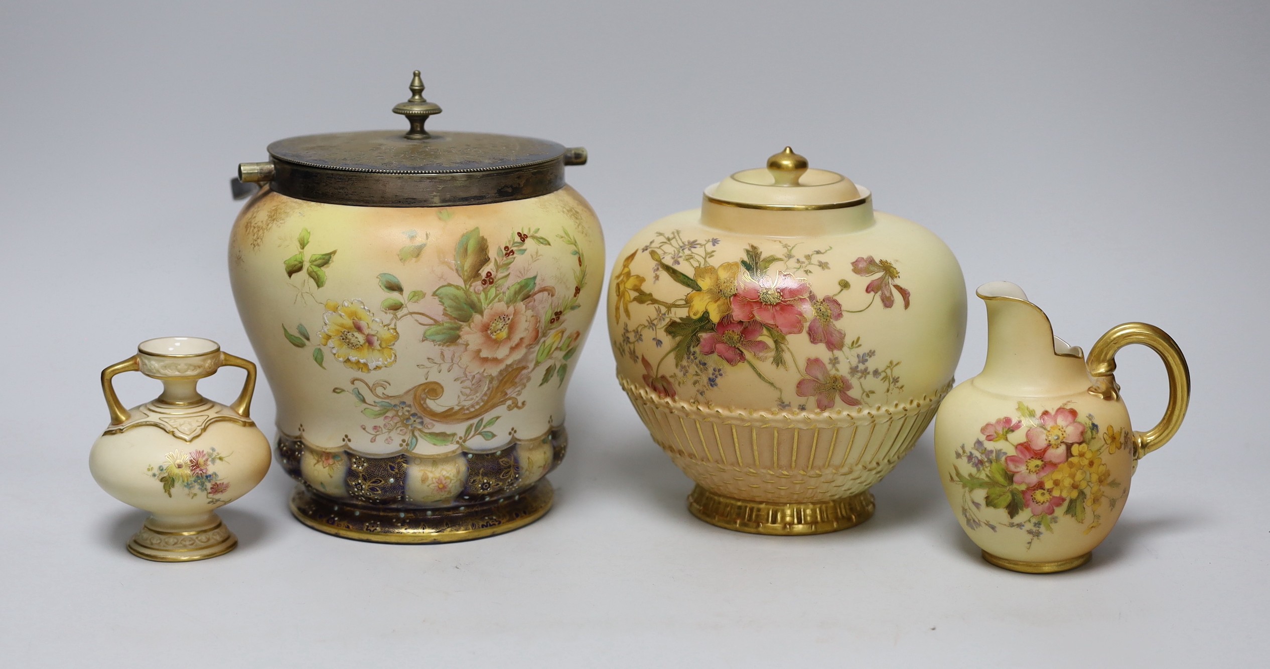 Three Royal Worcester blush vessels and a Carltonware biscuit barrel